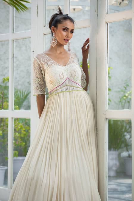 Buy Kanj By Priyanka A Sakhuja Ivory Silk Tabby Sequin, Cutdana And Bead Work Farleen Pleated Embroidered Gown Online at Aza Fashions Buy_Kanj By Priyanka A Sakhuja_Ivory Silk Tabby Sequin, Cutdana And Bead Work Farleen Pleated Embroidered Gown _Online_at_Aza_Fashions