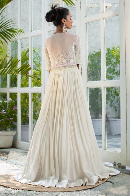 Shop Kanj By Priyanka A Sakhuja Ivory Silk Tabby Sequin, Cutdana And Bead Work Farleen Pleated Embroidered Gown at Aza Fashions Shop_Kanj By Priyanka A Sakhuja_Ivory Silk Tabby Sequin, Cutdana And Bead Work Farleen Pleated Embroidered Gown _at_Aza_Fashions
