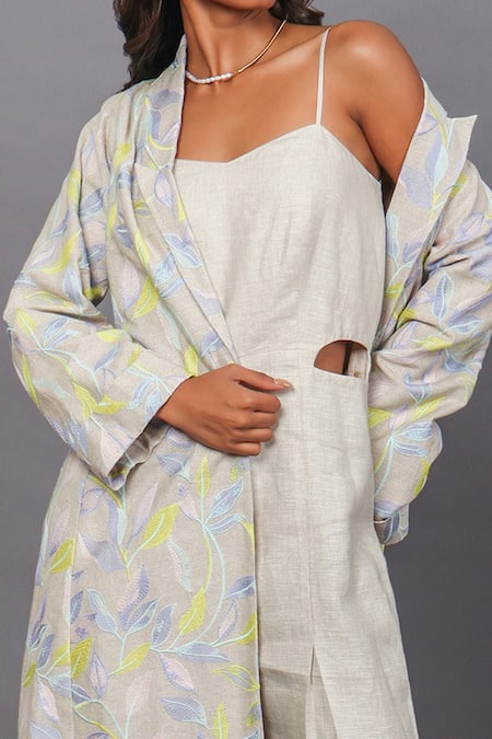 Shop_Couché By Anandini_Beige Lino Bordado (viscose+linen) Floral Jumpsuit V Neck Embroidered With _Online_at_Aza_Fashions