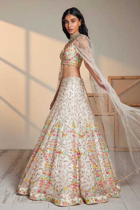 Buy Chamee And Palak Ivory Floral Pattern Plunge V Neck Calico Embroidered Lehenga And Blouse Set Online at Aza Fashions Buy_Chamee And Palak_Ivory Floral Pattern Plunge V Neck Calico Embroidered Lehenga And Blouse Set _Online_at_Aza_Fashions