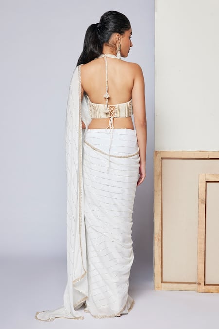Shop Chamee And Palak White Blouse Silk, Saree Georgette Pearls, Sequins Halter Ivy With Bralette at Aza Fashions Shop_Chamee And Palak_White Blouse Silk, Saree Georgette Pearls, Sequins Halter Ivy With Bralette _at_Aza_Fashions