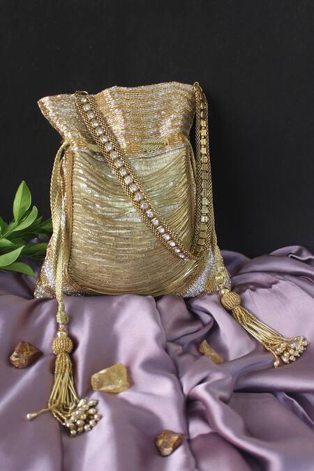 Shop_Nayaab By Sonia_Gold Chains, Tassels, Beads, Hinted Silver Embellished Salli Work Potli Bag _Online_at_Aza_Fashions