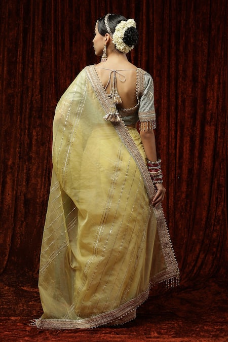 Shop Shikhar Sharma Yellow Embroidered Badla V Neck Silk Organza Saree With Blouse at Aza Fashions Shop_Shikhar Sharma_Yellow Embroidered Badla V Neck Silk Organza Saree With Blouse _at_Aza_Fashions