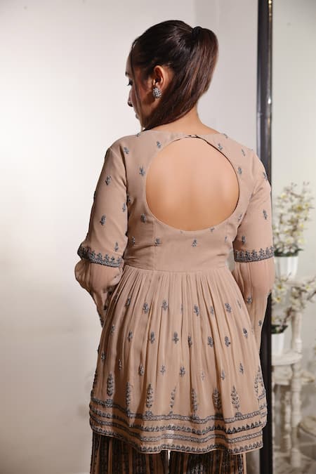 Shop_Jade By Ashima_Peach Net, Crepe V Neck Embroidered Peplum Kurta And Sharara Set _at_Aza_Fashions