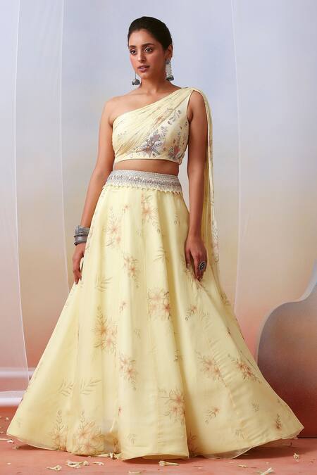 ISHA GUPTA TAYAL White Organza, Chiffon Floral Printed One Shoulder Blouse And Lehenga Set Online at Aza Fashions ISHA GUPTA TAYAL_White Organza, Chiffon Floral Printed One Shoulder Blouse And Lehenga Set _Online_at_Aza_Fashions