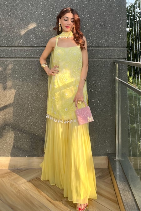 Buy Nitisha Kashyap Official Yellow Georgette, Net, Silk Sequins, Beads, Floral Embroidered Kurta Sharara Set Online at Aza Fashions Buy_Nitisha Kashyap Official_Yellow Georgette, Net, Silk Sequins, Beads, Floral Embroidered Kurta Sharara Set _Online_at_Aza_Fashions