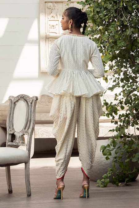 Shop Nikasha White Crepe, Banarasi Woven Cotton Round Kurta And Dhoti Pant Set at Aza Fashions Shop_Nikasha_White Crepe, Banarasi Woven Cotton Round Kurta And Dhoti Pant Set _at_Aza_Fashions