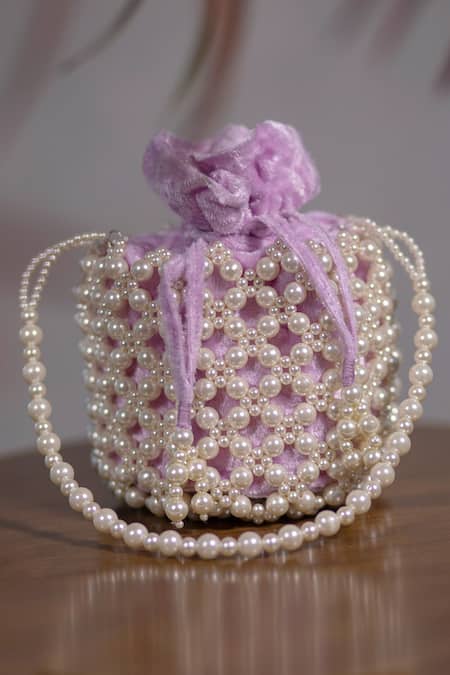 Shop Eena Purple Pearls Embellished Potli Bag at Aza Fashions Shop_Eena_Purple Pearls Embellished Potli Bag _at_Aza_Fashions