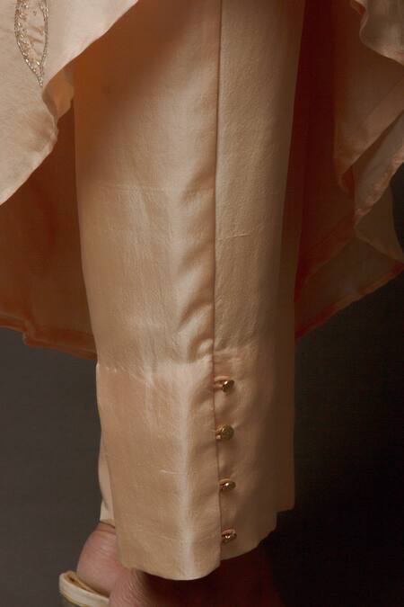 Shop Jasmine Bains Peach Cupro Crepe Asymmetric Tunic And Pant Set Online at Aza Fashions Shop_Jasmine Bains_Peach Cupro Crepe Asymmetric Tunic And Pant Set _Online_at_Aza_Fashions