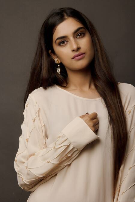 Jasmine Bains Peach Cupro Georgette Round Embellished Tunic at Aza Fashions Jasmine Bains_Peach Cupro Georgette Round Embellished Tunic _at_Aza_Fashions