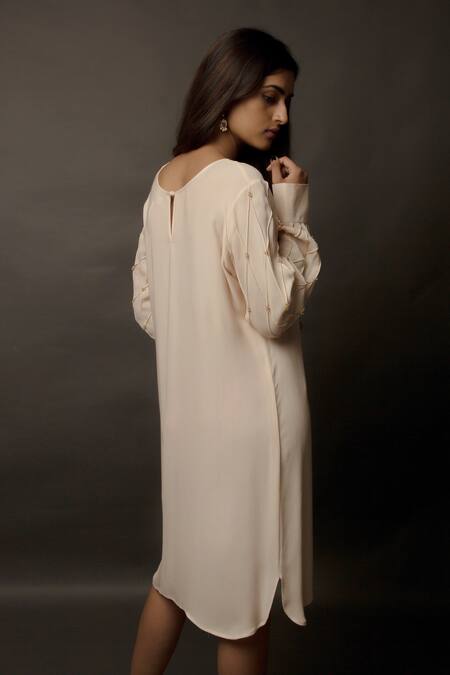 Shop Jasmine Bains Peach Cupro Georgette Round Embellished Tunic at Aza Fashions Shop_Jasmine Bains_Peach Cupro Georgette Round Embellished Tunic _at_Aza_Fashions