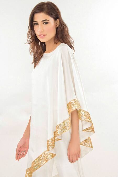 Jasmine Bains Ivory Silk Sequin Round One Shoulder Cape And Trouser Set Online at Aza Fashions Jasmine Bains_Ivory Silk Sequin Round One Shoulder Cape And Trouser Set _Online_at_Aza_Fashions