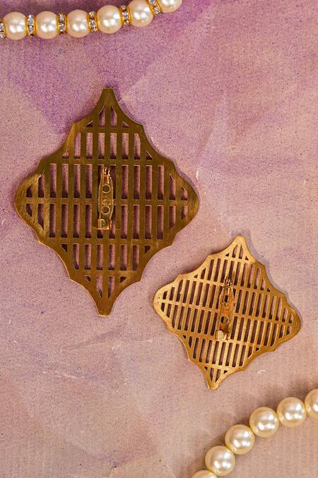 Shop_Jatin Malik_Gold Leaf Metal Cutout Kalangi Set Of 2 _Online_at_Aza_Fashions