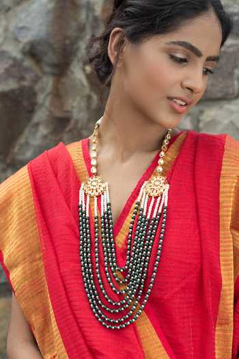 Shop Just Shradhas Gold Plated Kundan Layered Long Necklace at Aza Fashions Shop_Just Shradhas_Gold Plated Kundan Layered Long Necklace _at_Aza_Fashions