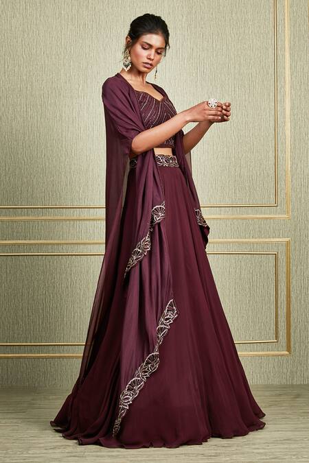 Shop_Charu and Vasundhara_Maroon Paper Silk Leaf Neck Layered Cape Lehenga Set _at_Aza_Fashions