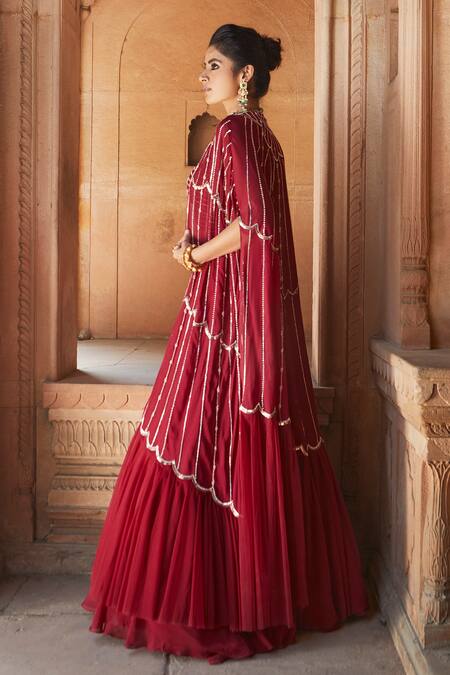Charu And Vasundhara_Red Blouse- Tussar Silk, Cape- Georgette And Net, Lehenga- Embellished Set_Online_at_Aza_Fashions