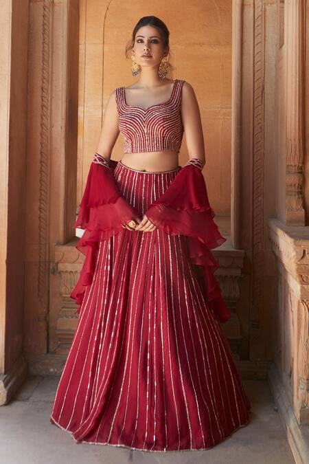 Charu And Vasundhara Red Blouse- Tussar Silk, Dupatta- Organza And Chiffon, Lehenga- Embellished Set Online at Aza Fashions Charu And Vasundhara_Red Blouse- Tussar Silk, Dupatta- Organza And Chiffon, Lehenga- Embellished Set_Online_at_Aza_Fashions