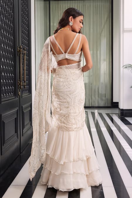 Charu And Vasundhara Ivory Blouse Tussar And Saree Organza & Chiffon Sequin & Elea Lehenga With Online at Aza Fashions Charu And Vasundhara_Ivory Blouse Tussar And Saree Organza & Chiffon Sequin & Elea Lehenga With _Online_at_Aza_Fashions