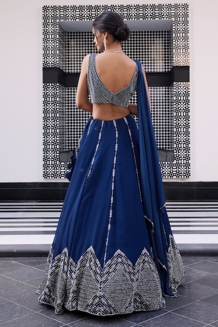 Buy Electric blue embroidered lehenga set by Aman Takyar at Aashni and Co