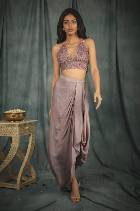 Shop Nikita Vishakha Purple Modal Satin Crochet Work Halter Neck Bralette And Cowl Skirt Set at Aza Fashions Shop_Nikita Vishakha_Purple Modal Satin Crochet Work Halter Neck Bralette And Cowl Skirt Set _at_Aza_Fashions