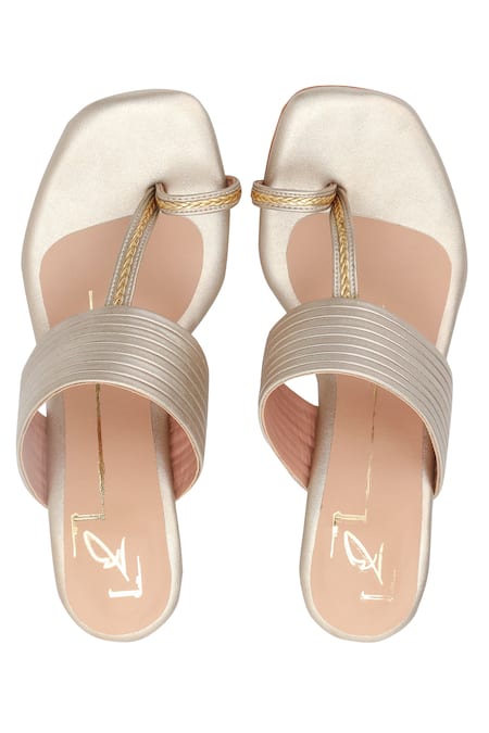 Shop Nidhi Bhandari Gold Pleated Kolhapuri Block Heels at Aza Fashions Shop_Nidhi Bhandari_Gold Pleated Kolhapuri Block Heels _at_Aza_Fashions