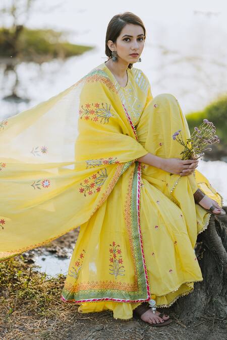 Shop Kaia Yellow Cotton Mul Round Embroidered Kurta Sharara Set at Aza Fashions Shop_Kaia_Yellow Cotton Mul Round Embroidered Kurta Sharara Set_at_Aza_Fashions