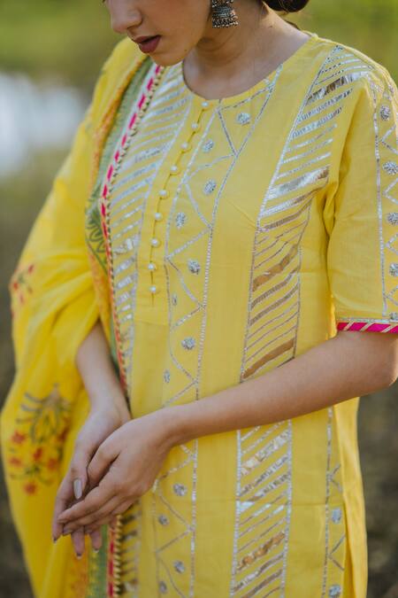Shop Kaia Yellow Cotton Mul Round Embroidered Kurta Sharara Set Online at Aza Fashions Shop_Kaia_Yellow Cotton Mul Round Embroidered Kurta Sharara Set_Online_at_Aza_Fashions