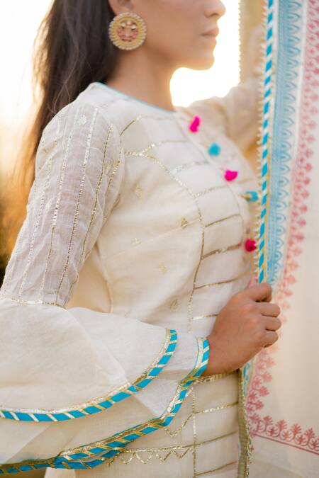 Buy_Kaia_White Cotton Mul Round Embroidered Kurta Sharara Set_Online_at_Aza_Fashions