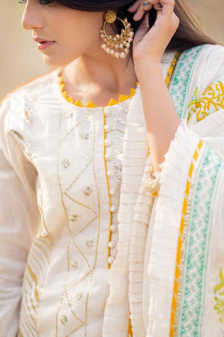 Buy_Kaia_White Cotton Mul Round Embroidered Kurta Gharara Set _Online_at_Aza_Fashions