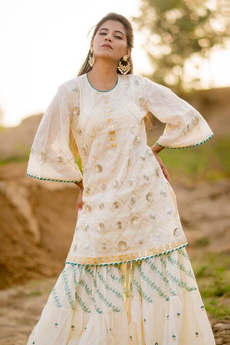 Kaia_White Cotton Mul Round Embroidered Kurta Sharara Set_Online_at_Aza_Fashions