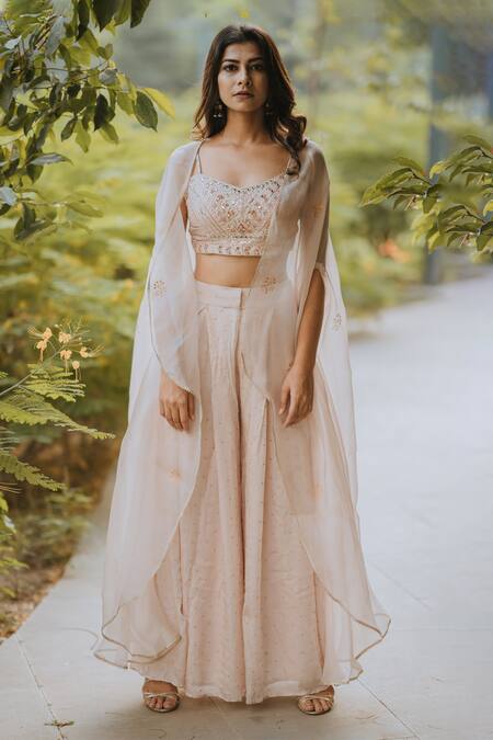 Shop Kaia Gold Silk, Organza, Satin V Neck Cape And Pant Set at Aza Fashions Shop_Kaia_Gold Silk, Organza, Satin V Neck Cape And Pant Set_at_Aza_Fashions