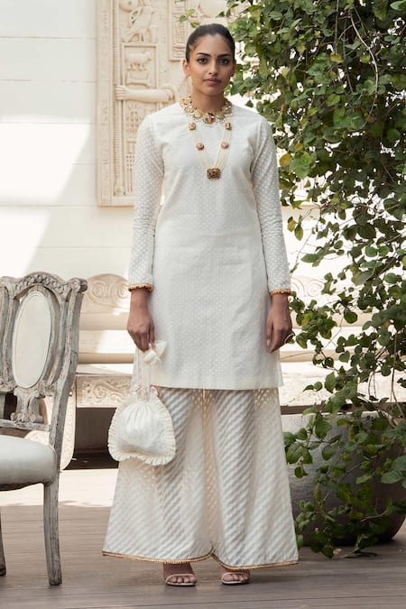 Nikasha White Crepe, Banarasi Woven Cotton Round Kurta Set Online at Aza Fashions Nikasha_White Crepe, Banarasi Woven Cotton Round Kurta Set _Online_at_Aza_Fashions
