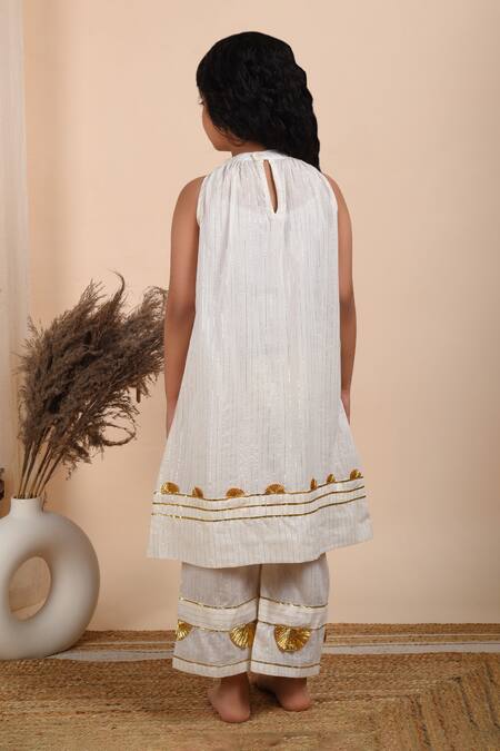 Shop THE COTTON STAPLE White Cotton Gota Patti Heer Embroidered Kurta Palazzo Set at Aza Fashions Shop_THE COTTON STAPLE_White Cotton Gota Patti Heer Embroidered Kurta Palazzo Set _at_Aza_Fashions