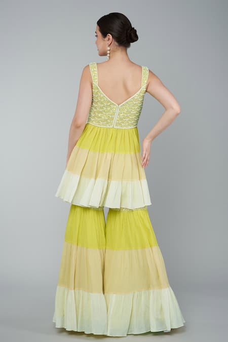 Shop Keith Gomes Yellow Georgette, Cotton Chiffon Sequins Embroidered Peplum Top And Gharara Set at Aza Fashions Shop_Keith Gomes_Yellow Georgette, Cotton Chiffon Sequins Embroidered Peplum Top And Gharara Set_at_Aza_Fashions
