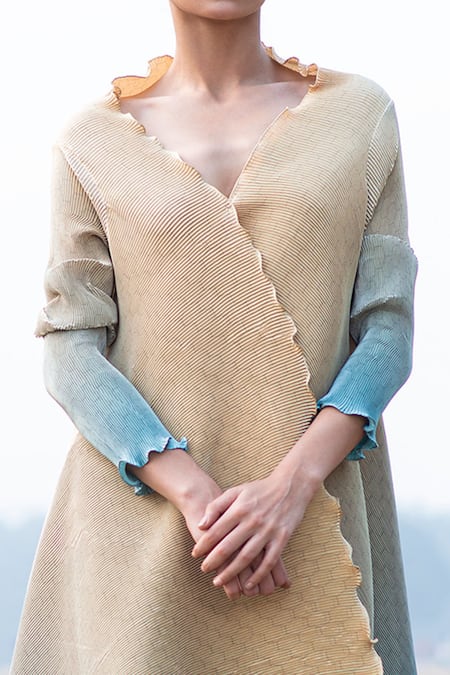 Kiran Uttam Ghosh Yellow Polyester V Neck Pleated Asymmetric Wrap Tunic Online at Aza Fashions Kiran Uttam Ghosh_Yellow Polyester V Neck Pleated Asymmetric Wrap Tunic _Online_at_Aza_Fashions