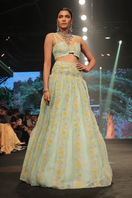 Keerthi Kadire_Green Raw Silk, Organza Floral Applique Plunge Neck Pleated Lehenga And Blouse Set _Online_at_Aza_Fashions