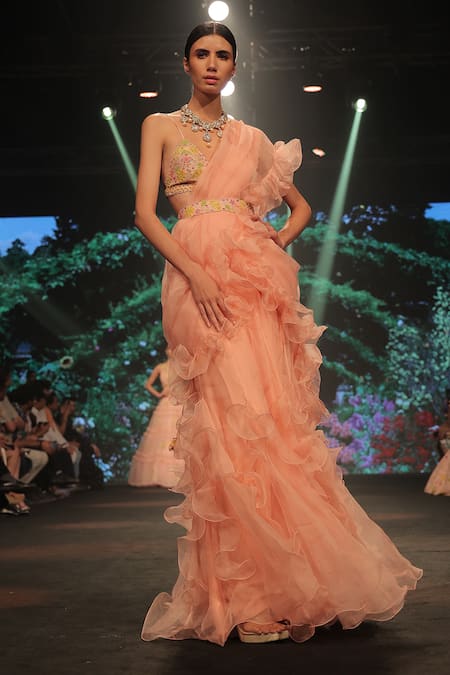 Keerthi Kadire_Peach Raw Silk, Organza Floral Applique Pre-draped Ruffle Saree With Blouse _Online_at_Aza_Fashions