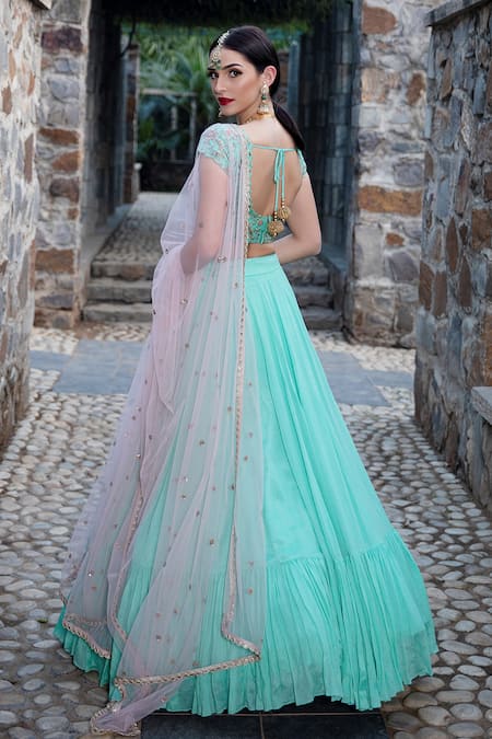 Shop Keerthi Kadire Green Raw Silk, Crepe Scoop Neck Blouse And Lehenga Set at Aza Fashions Shop_Keerthi Kadire_Green Raw Silk, Crepe Scoop Neck Blouse And Lehenga Set _at_Aza_Fashions