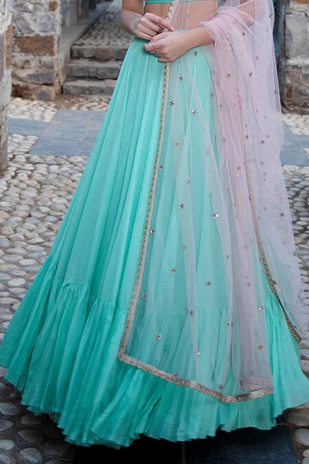 Keerthi Kadire Green Raw Silk, Crepe Scoop Neck Blouse And Lehenga Set at Aza Fashions Keerthi Kadire_Green Raw Silk, Crepe Scoop Neck Blouse And Lehenga Set _at_Aza_Fashions