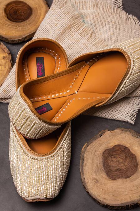 Kasually Klassy White Pearl Embroidered Juttis Online at Aza Fashions Kasually Klassy_White Pearl Embroidered Juttis_Online_at_Aza_Fashions