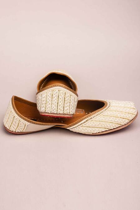Buy Kasually Klassy White Pearl Embroidered Juttis Online at Aza Fashions Buy_Kasually Klassy_White Pearl Embroidered Juttis_Online_at_Aza_Fashions