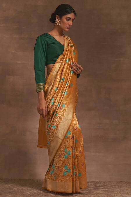 Kasturi Kundal_Yellow Phool Butta Floral Jangla Saree _Online_at_Aza_Fashions