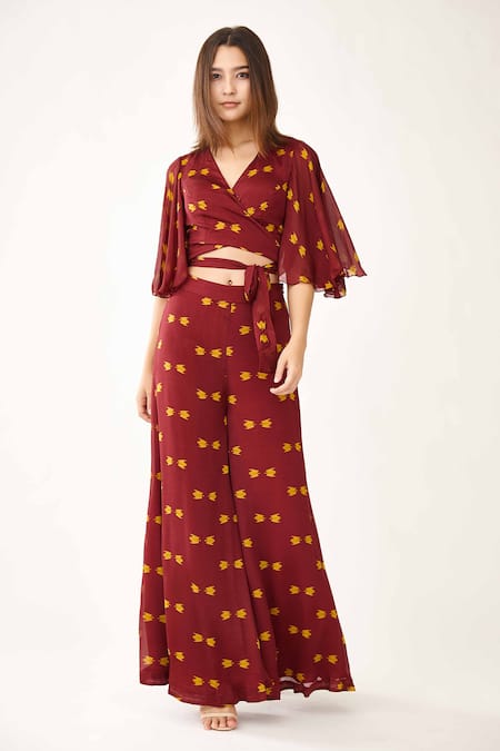 Shop Koai Maroon Chiffon Geometric Pattern Flared Pant at Aza Fashions Shop_Koai_Maroon Chiffon Geometric Pattern Flared Pant_at_Aza_Fashions