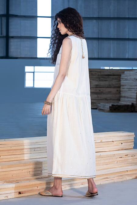 Buy Kharakapas Ivory Cotton Silk Gold Foil Print U Neck Anouk Drop-waist Dress Online at Aza Fashions Buy_Kharakapas_Ivory Cotton Silk Gold Foil Print U Neck Anouk Drop-waist Dress _Online_at_Aza_Fashions