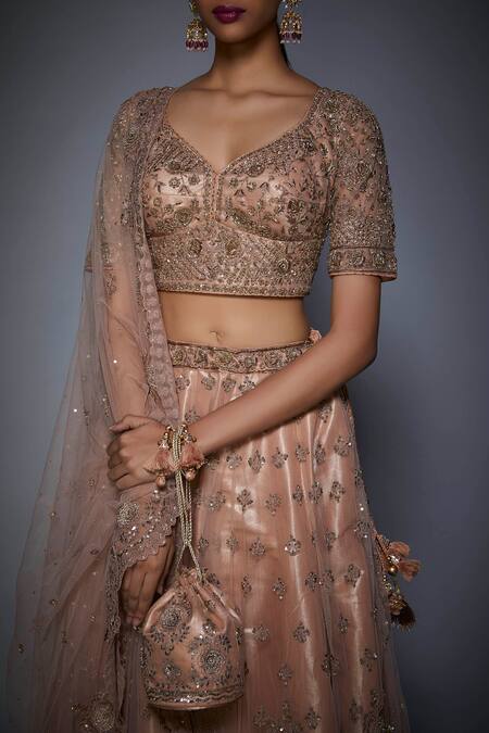 RI.Ritu Kumar_Pink Net V-shaped Neckline Embroidered Bridal Lehenga Set _at_Aza_Fashions