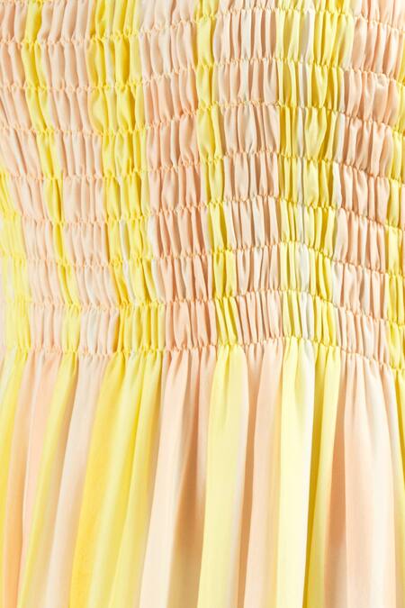 Vedika M_Yellow Crepe Tiered Maxi Dress_at_Aza_Fashions