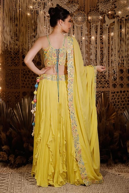 Lehenga Choli : Yellow net ruffle lehenga choli