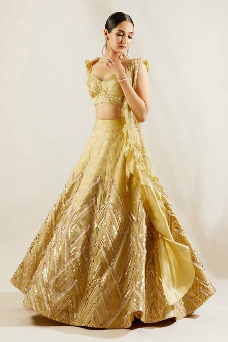 Buy Adaara Couture Gold Raw Silk, Net Sweetheart Neck Embellished Bridal Lehenga Set Online at Aza Fashions Buy_Adaara Couture_Gold Raw Silk, Net Sweetheart Neck Embellished Bridal Lehenga Set _Online_at_Aza_Fashions