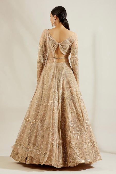 Shop Adaara Couture Gold Net, Satin V Neck Embellished Bridal Lehenga Set at Aza Fashions Shop_Adaara Couture_Gold Net, Satin V Neck Embellished Bridal Lehenga Set _at_Aza_Fashions