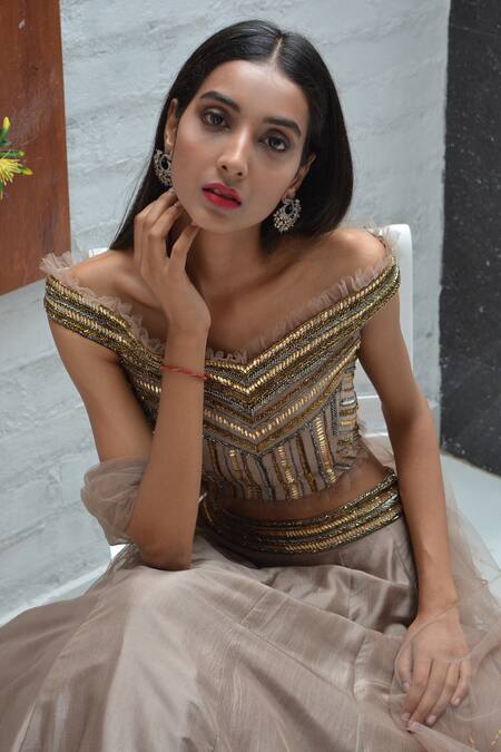 Parul Gandhi_Brown Net, Paper Silk V Neck Embroidered Off Shoulder Lehenga Set _at_Aza_Fashions